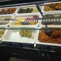 From left to right, top to bottom, carrot salad, smoked eggplant salad with peppers (the best), bean salad, dolme (vine leaves with rice inside), small peppers with cheese, lens and bulgur balls (my favorite), chickpeas salad, lens salad with mint leaves, walnut caviar  at Traiteur Le Cedre in Le Plessis-robinson