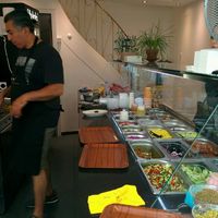 making our amazing falafel wrap at Za Zaa Barfi - Gerbergasse in Basel