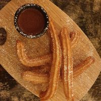 Churros w/chocolate sauce $17.00 at Basco in Brunswick