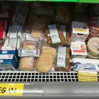 Fridge with some vegan essentials - tofu products, vegan spreads, etc. at Bio ABC in Budapest