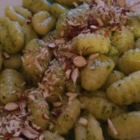 Gnocchi with pesto and almond chips. at Trattoria Di Mirko in Alghero