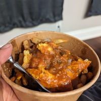 Butter chicken curry with fries at Saigon Lotus in Toronto