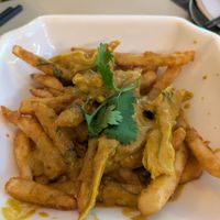 Butter chicken poutine at Saigon Lotus in Toronto