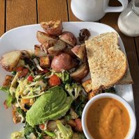Vegan Scramble: tofu, broccoli, green onions, pepper, tomato, spinach, cabbage, mushrooms, and avocado. I added ranchero sauce on the side, potatoes and toast. Plant milk w/coffee  at Cheryl's on 12th & As Good As It Gets in Portland