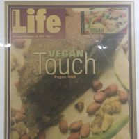 featured in the local paper at Sweet Vegan Cafe in Kingston