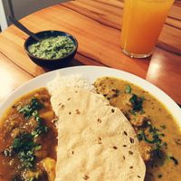 Half Potato and bean curry, half soya chunks lentil curry with rice and papadam at DS Arjuna in Vienna