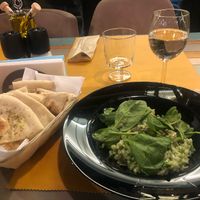 Broccoli risotto and rosemary focaccia  at Alouette in Bucharest