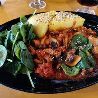 Mushrooms and spinach with polenta at Alouette in Bucharest