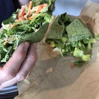 Veggie hummus wrap. Hubs got started eating before I could get a pic of this HUGE wrap!  at Lolo Kai Smoothies & Wraps in Galveston