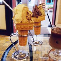 Vegan kinako (roasted soy) gelato and ume sorbet in the front, vegan dark chocolate and pistachio gelato in the back, iced coffee with soy milk at Premarché Gelateria in Kyoto