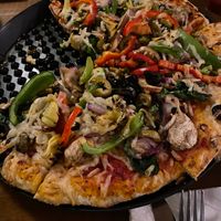 Vegan Veggie Mediterranean -
Artichokes, Mushrooms, Black & Green Olives, Red & Green Onions, Spinach, Red & Green Peppers, Pesto & Traditional Red Sauce 
 at Loggers Tap House in Roseburg