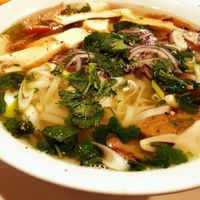 strong vegetable broth with rice noodles at Amitabha in Prague