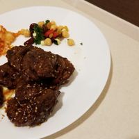 Mock meat, lots a hoison sauce. Kimchi too at Amitabha in Prague