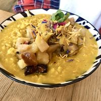 Veganes Kurkuma-Porridge mit Kompott (Demeter!) at Satt und Glücklich in Kassel