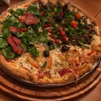 Mix de cogumelos, “vrango” com catupop e rúcula, tomate seco e chèvre   at Pop Vegan Food in Sao Paulo