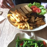 Tofu Steak with Mushrooms and Chips at Dow Vegan Restaurant in Koh Phi Phi