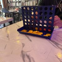 Game while we wait  at Dow Vegan Restaurant in Koh Phi Phi