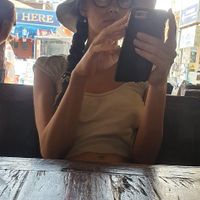 She waits for oil free sugar rich vegan food at Dow Vegan Restaurant in Koh Phi Phi