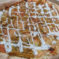 New Pizza Vegana Sahar. I really loved it. Nice herbs and spices combined on a shwarma style pizza. at Pizzeria La Faina in Malaga