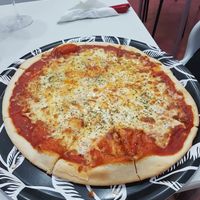 Pizza quattro formaggi (not vegan) at Pizzeria La Faina in Malaga