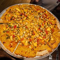 Fire-breathing dragon made vegan with the RiNOTa cheese at Pizza Luce in Richfield