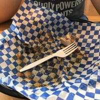 The Poutine did not last long. Mmmmmm. If you want to see it, order it. Eat it! at Frickin' Delights Donuts in Devon