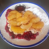 Vegan Belgian Waffles: Warm cinnamon apples, Berry compote, whipped cream & maple syrup at The Koffee Pot in Manchester