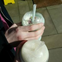 A blue raspberry milkshake and a vegan piña colada milkshake at The Origami Cafe & Gift Shop in Alnwick
