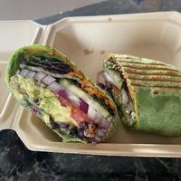 Black bean on spinach wrap  at Apple a Day Store & Cafe in Miami Beach