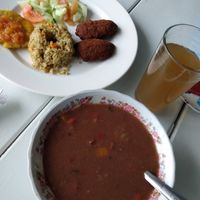 Bean soup, plate with four items, juice drink at Mandira in Pereira