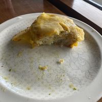 Cheesy hash brown (sorry it’s half eaten 😂) at Portershed in Christchurch