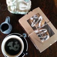 Fantastic Cookies & Cream Doughnuts boxed for take-out. Seriously good! at Portershed in Christchurch