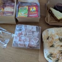 Lip balm, two snack bags, citrus slice & Bounty Bar, focaccia bread, Turkish Delight, chocolate lollies. at Portershed in Christchurch
