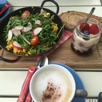 Tofu scramble,  overnight oats and Cappuccino with rice milk at Landtmann's Jausen Station in Vienna