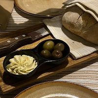 Homemade bread with olives and vegan garlic butter (Margarine)  at Select in Kos