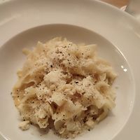 Pre-main course, fine noodles with creamy sauce and vegan cheese at Blume Wollbach in Kandern