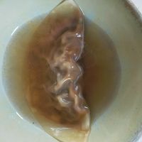 Raviolis ail noir et bouillon dashi at Humus x Hortense in Brussels