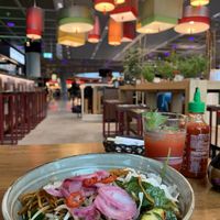 Fried veggie noodles and strawberry lemonade with mint at FRA - Coa - T1 in Frankfurt