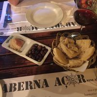 Olives from Terceira and bolos levedos from Furnas. at Taberna Acor in Sao Miguel