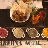 Vegan Trilogy with peppers, cucumber, carrots, tortillas and sweet potato chips. 4 different kind of humuses to dip in   at Taberna Acor in Sao Miguel