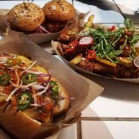 Chilli cheez dog, chickn sliders and vegan spice bag strips/fries combo at Token in Dublin