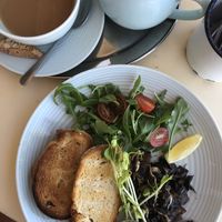 mushrooms on sourdough bread with cashew feta, baby spinach and rocket. Breakfast tea with almond milk at The Social Society in Exmouth