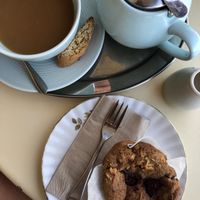 Raspberry and coconut muffin with a cuppa 🌱🧡 at The Social Society in Exmouth