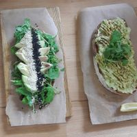 Sliced avocado on toast (veganised), and smashed avo on toast (vegan) at Coffee Room in Prague