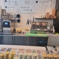 behind the counter at Low C in Ypres