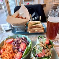 Gyro with salad, club sandwich with sweet potato fries at Veggiezz - Opernring in Vienna