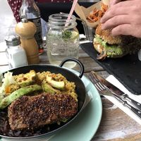 Seitan steak with pumpkin quinotto and farmer burger at Veggiezz - Opernring in Vienna