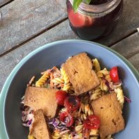 Pasta salad with tofu, leek, red cabbage, carrots and pumpkin seed oil and ginger, hibiscus and mint lemonade. at Veggiezz - Opernring in Vienna
