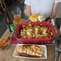 Fries, nachos, cheese croquettes, lobster roll at The Judgy Vegan in Brussels