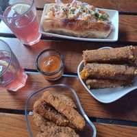 Iced tea, seitan wings, cheese sticks, lobster roll at The Judgy Vegan in Brussels